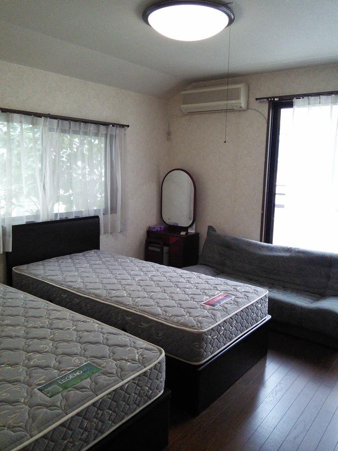 Guesthouse Cosmo Tokushima Exterior foto
