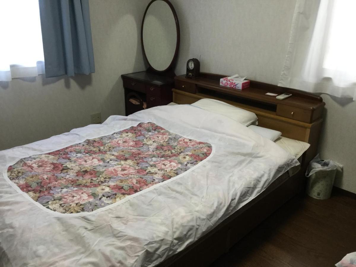 Guesthouse Cosmo Tokushima Exterior foto